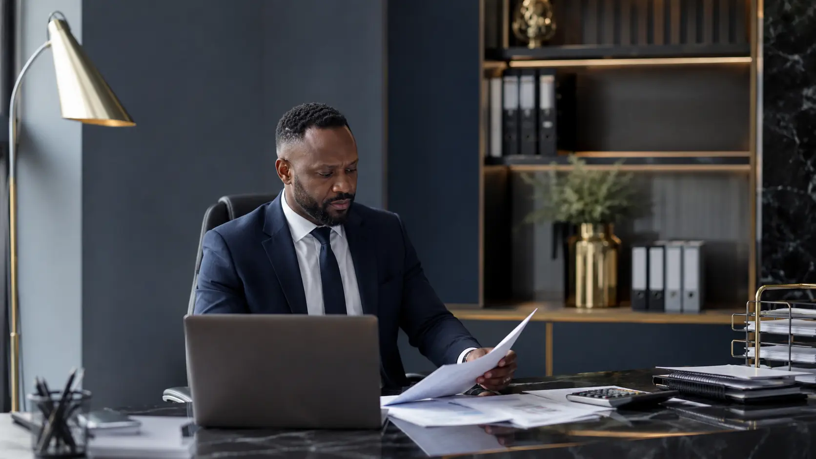Accountant reviewing tax documents at an office desk